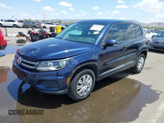 2013 Volkswagen Tiguan with VIN WVGCV3AX6DW605876, listed as a IAAI auction lot 42431619 with 106,279 mi miles and . Bid and sale history available at DreamBid. Image 2.