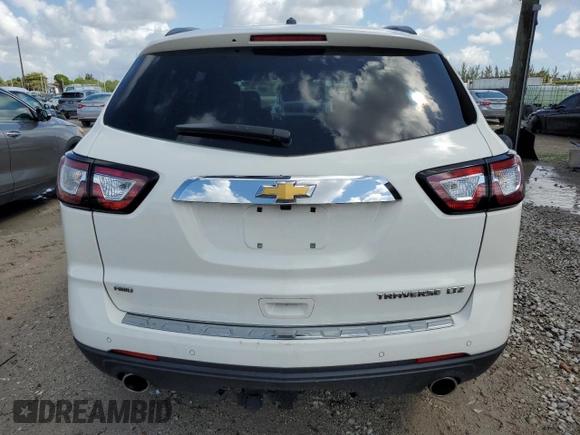 2015 Chevrolet Traverse LTZ with VIN 1GNKVJKDXFJ212107, listed as a Copart auction lot 55721935 with 129,333 mi miles and Clean Title. Bid and sale history available at DreamBid. Image 6.