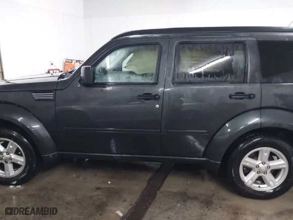 2010 Dodge Nitro SXT with VIN 1D4PU5GK0AW126478, listed as a IAAI auction lot 41362674 with 171,704 mi miles. Bid and sale history available at carsss.com. Image 15.