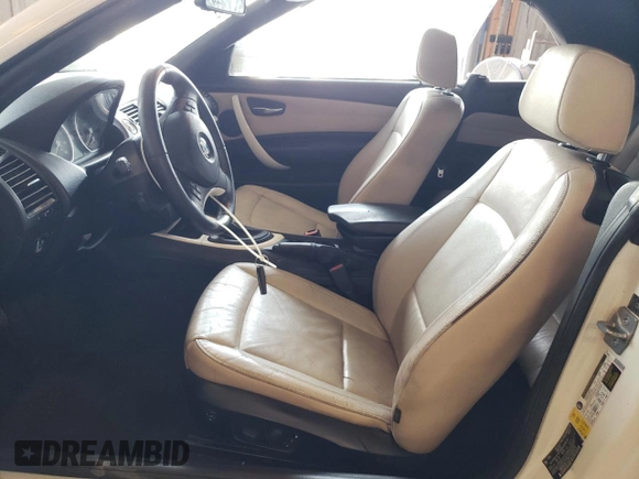 2012 BMW 1 Series 128i with VIN WBAUN1C5XCVH84372, listed as a Copart auction lot 54162815 with 127,420 mi miles and Clean title. Bid and sale history available at DreamBid. Image 7.