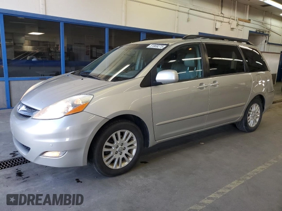 2010 Toyota Sienna XLE with VIN 5TDYK4CC0AS309461, listed as a Copart auction lot 51869275 with 156,598 mi miles and Salvage Title. Bid and sale history available at carsss.com. Image 1.