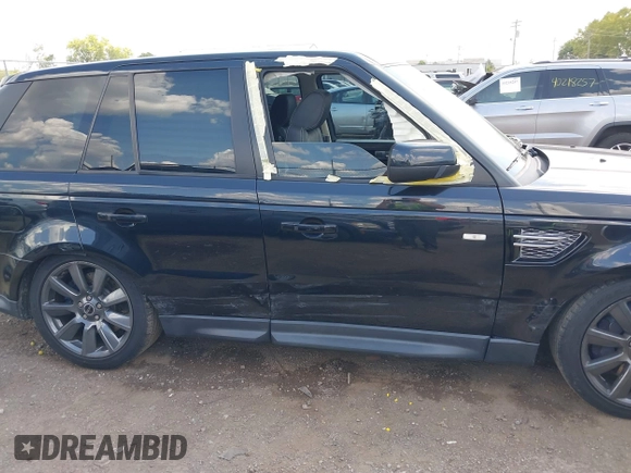 2012 Land Rover Range Rover Sport SC with VIN SALSH2E49CA720591, listed as a IAAI auction lot 40217754 with 122,643 mi miles. Bid and sale history available at carsss.com. Image 13.