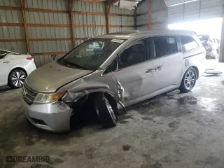 2011 Honda Odyssey EX-L with VIN 5FNRL5H68BB076882, listed as a Copart auction lot 51835945 with 176,431 mi miles and Salvage Title. Bid and sale history available at carsss.com. Image 1.
