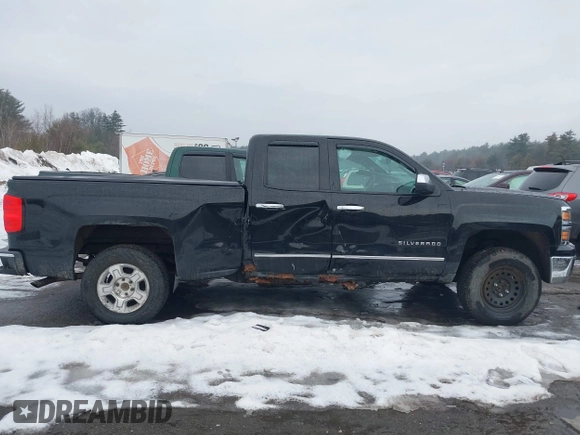 2014 Chevrolet Silverado 1500 LTZ with VIN 1GCVKSEC0EZ390082, listed as a IAAI auction lot 41595196 with 161,349 mi miles and . Bid and sale history available at DreamBid. Image 13.