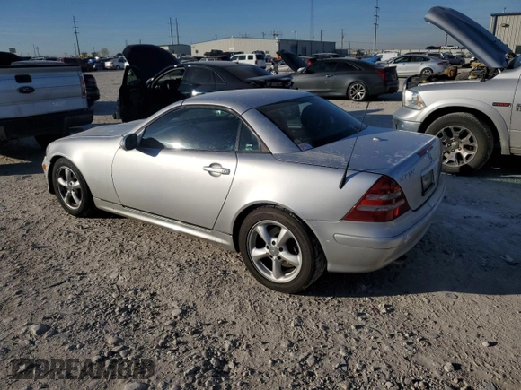 2004 Mercedes-Benz SLK-Class with VIN WDBKK65FX4F300214, listed as a Copart auction lot 82160974 with 75,964 mi miles and Salvage Title. Bid and sale history available at carsss.com. Image 2.