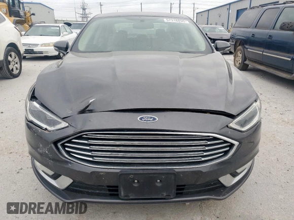 2017 Ford Fusion Hybrid Titanium with VIN 3FA6P0RU7HR388521, listed as a Copart auction lot 57318895 with 117,720 mi miles and Salvage title. Bid and sale history available at DreamBid. Image 5.