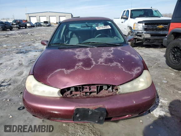 1998 Ford Contour LX with VIN 1FAFP66L4WK261970, listed as a Copart auction lot 42735485 with 106,450 mi miles and Salvage title. Bid and sale history available at DreamBid. Image 5.