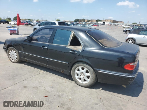 2001 Mercedes-Benz E-Class with VIN WDBJF65J01B225871, listed as a Copart auction lot 66136994 with 2,139,454 mi miles and Clean Title. Bid and sale history available at carsss.com. Image 2.