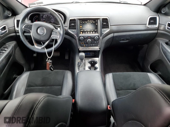 2017 Jeep Grand Cherokee Altitude with VIN 1C4RJFAG4HC737909, listed as a Copart auction lot 64542325 with 36,618 mi miles and Salvage title. Bid and sale history available at DreamBid. Image 8.