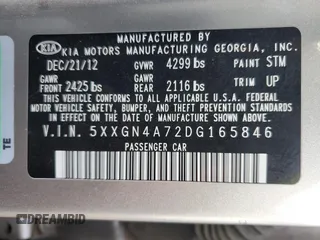 2013 Kia Optima EX z VIN 5XXGN4A72DG165846, wystawiony jako Copart lot #54597195 z przebiegiem 175 218 mil mil oraz Szkoda całkowita • Salvage title. Historia ofert i sprzedaży dostępna na DreamBid. Obrazek 13.