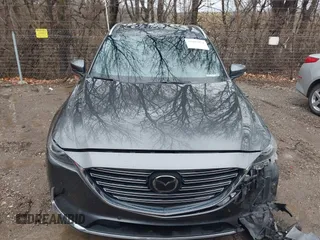 2020 Mazda CX-9 Signature with VIN JM3TCBEY4L0422752, listed as a IAAI auction lot 41207874 with 32,528 mi miles and . Bid and sale history available at carsss.com. Image 12.