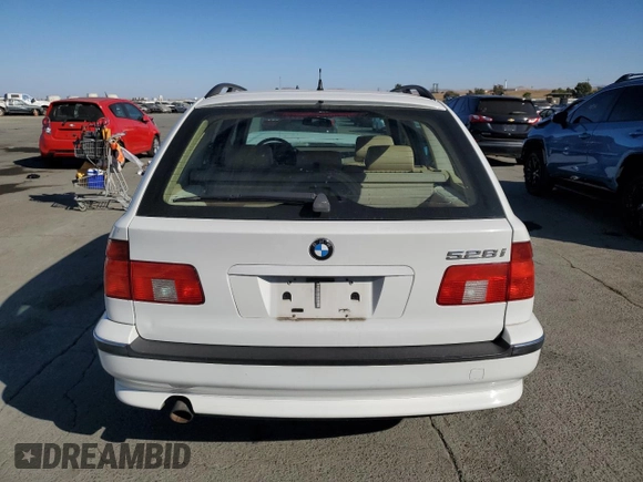 1999 BMW 5 Series 528iAt with VIN WBADP6330XBV61784, listed as a Copart auction lot 77685734 with 210,383 mi miles and Salvage Title. Bid and sale history available at carsss.com. Image 6.