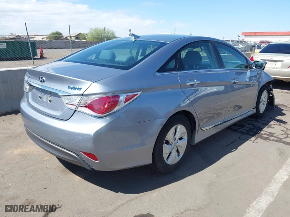 2015 Hyundai Sonata Hybrid Limited with VIN KMHEC4A41FA133127, listed as a IAAI auction lot 41759254 with 70,124 mi miles. Bid and sale history available at carsss.com. Image 4.