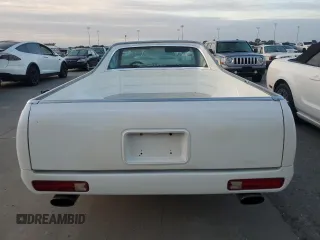 1984 Chevrolet El Camino z VIN 1GCCW80H6ER150486, wystawiony jako Copart lot #76031834 z przebiegiem 77 554 mil mil oraz Szkoda całkowita • Salvage title. Historia ofert i sprzedaży dostępna na DreamBid. Obrazek 6.