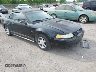 2000 Ford Mustang with VIN 1FAFP4048YF163834, listed as a IAAI auction lot 42090407 with 161,928 mi miles. Bid and sale history available at carsss.com. Image 1.