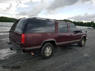 1999 Chevrolet Suburban with VIN 3GNEC16RXXG260623, listed as a Copart auction lot 54609694 with 246,460 mi miles and Salvage Title. Bid and sale history available at carsss.com. Image 3.