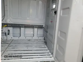2023 Ford Transit Cargo z VIN 1FTYE1C89PKA17390, wystawiony jako Copart lot #83939214 z przebiegiem 76 099 mil mil oraz Szkoda całkowita • Salvage title. Historia ofert i sprzedaży dostępna na DreamBid. Obrazek 11.