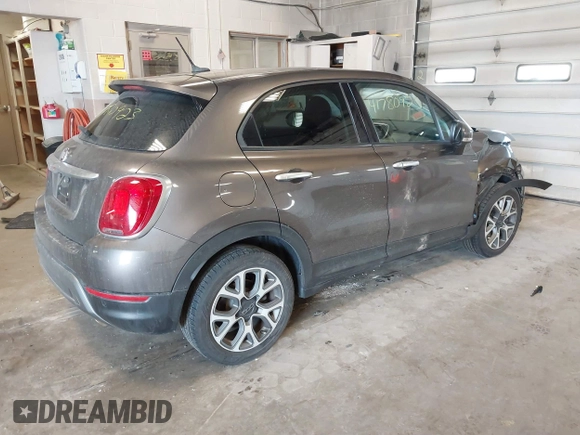 2016 FIAT 500X Trekking with VIN ZFBCFXCT0GP329255, listed as a IAAI auction lot 41780923 with 81,910 mi miles and . Bid and sale history available at DreamBid. Image 4.