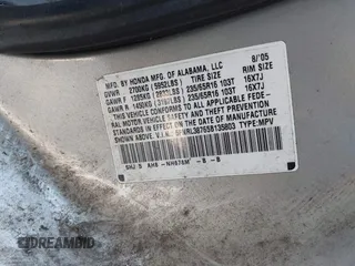 2005 Honda Odyssey EX-L z VIN 5FNRL38765B135803, wystawiony jako IAAI lot #42421288 z przebiegiem 185 043 mil mil oraz . Historia ofert i sprzedaży dostępna na DreamBid. Obrazek 9.