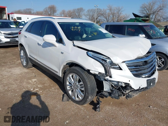 2017 Cadillac XT5 Premium Luxury AWD z VIN 1GYKNERS3HZ284561, wystawiony jako IAAI lot #41887147 z przebiegiem 119 189 mil mil oraz . Historia ofert i sprzedaży dostępna na DreamBid. Obrazek 1.