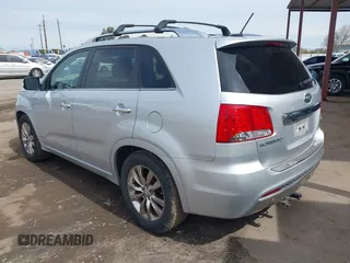 2012 Kia Sorento SX with VIN 5XYKWDA26CG255894, listed as a IAAI auction lot 41827895 with 160,144 mi miles. Bid and sale history available at carsss.com. Image 3.