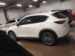 2019 Mazda CX-5 Signature with VIN JM3KFBEY5K0520593, listed as a IAAI auction lot 41638594 with 111,504 mi miles. Bid and sale history available at carsss.com. Image 14.