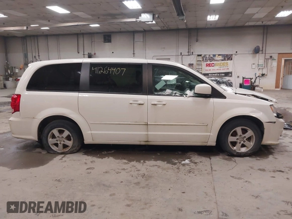 2012 Dodge Grand Caravan SXT with VIN 2C4RDGCG3CR405373, listed as a IAAI auction lot 41264407 with 164,019 mi miles and . Bid and sale history available at DreamBid. Image 14.