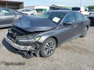 2020 Honda Accord Touring with VIN 1HGCV3F90LA013434, listed as a IAAI auction lot 42075502 with 56,645 mi miles and . Bid and sale history available at DreamBid. Image 18.
