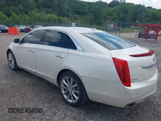 2013 Cadillac XTS Luxury with VIN 2G61P5S34D9138319, listed as a IAAI auction lot 42626756 with 88,743 mi miles and . Bid and sale history available at DreamBid. Image 3.
