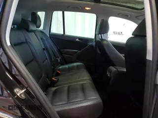 2017 Volkswagen Tiguan Sport z VIN WVGUV7AXXHK007234, wystawiony jako Copart lot #60206065 z przebiegiem 133 316 mil mil oraz Szkoda całkowita • Salvage title. Historia ofert i sprzedaży dostępna na DreamBid. Obrazek 11.