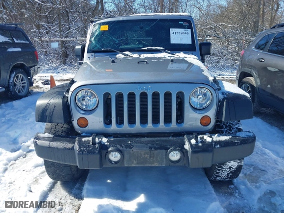 2013 Jeep Wrangler Unlimited Sport with VIN 1C4BJWDGXDL651995, listed as a IAAI auction lot 41578040 with 114,698 mi miles. Bid and sale history available at carsss.com. Image 12.