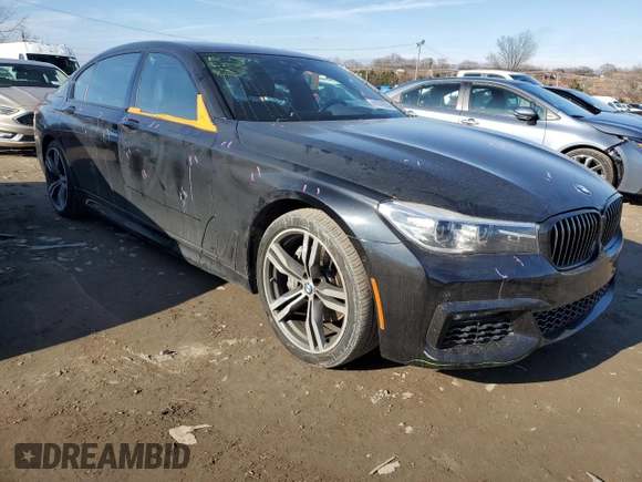 2018 BMW 7 Series 740i xDrive with VIN WBA7E4C56JGV28100, listed as a Copart auction lot 41079924 with 63,891 mi miles. Bid and sale history available at carsss.com. Image 4.