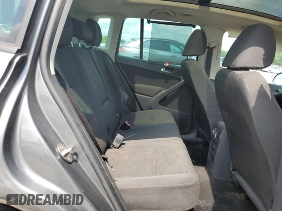 2012 Volkswagen Tiguan SE z VIN WVGAV7AX5CW004889, wystawiony jako Copart lot #57346115 z przebiegiem 100 503 mil mil oraz Szkoda całkowita • Salvage title. Historia ofert i sprzedaży dostępna na DreamBid. Obrazek 11.