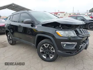 2018 Jeep Compass Trailhawk with VIN 3C4NJDDB3JT451658, listed as a IAAI auction lot 42087588 with 90,189 mi miles and . Bid and sale history available at DreamBid. Image 1.