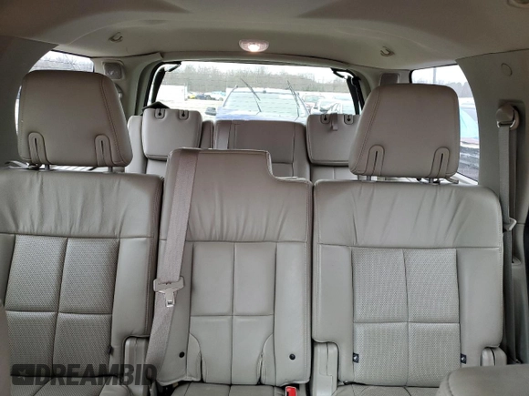 2014 Lincoln Navigator z VIN 5LMJJ2J55EEL06038, wystawiony jako Copart lot #49721105 z przebiegiem 97 659 mil mil oraz Szkoda całkowita • Salvage title. Historia ofert i sprzedaży dostępna na DreamBid. Obrazek 10.