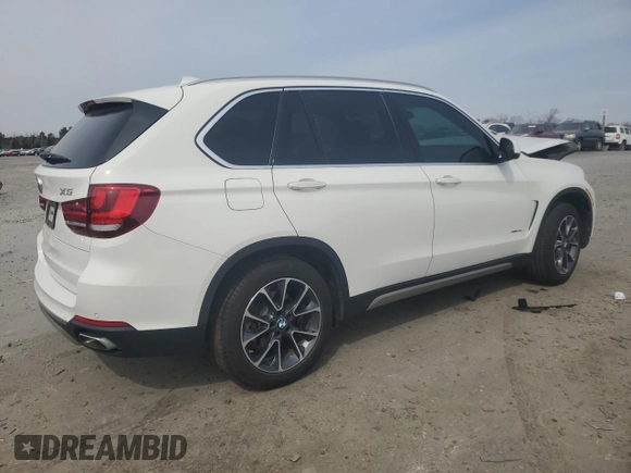 2018 BMW X5 xDrive35i with VIN 5UXKR0C53J0Y06551, listed as a Copart auction lot 47785945 with 75,029 mi miles and Salvage Title. Bid and sale history available at carsss.com. Image 3.