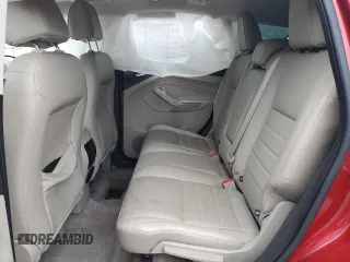 2013 Ford Escape SEL с VIN 1FMCU9H98DUA51653, выставлен на аукционе Copart как лот 57997595 с пробегом 138 483 миль миль и Списание • Salvage title. История ставок и продаж доступна на DreamBid. Изображение 11.