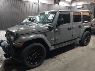 2022 Jeep Wrangler Unlimited Sahara with VIN 1C4JJXP66NW198723, listed as a IAAI auction lot 41368728 with 31,814 mi miles and . Bid and sale history available at DreamBid. Image 18.