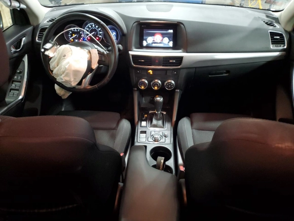 2016 Mazda CX-5 Touring z VIN JM3KE4CY5G0852073, wystawiony jako Copart lot #56599055 z przebiegiem 72 167 mil mil oraz Szkoda całkowita • Salvage title. Historia ofert i sprzedaży dostępna na DreamBid. Obrazek 8.