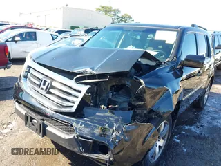 2015 Honda Pilot Touring with VIN 5FNYF3H97FB016390, listed as a IAAI auction lot 41753590 with 217,156 mi miles. Bid and sale history available at carsss.com. Image 6.