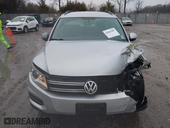 2017 Volkswagen Tiguan S with VIN WVGBV7AX4HK051172, listed as a IAAI auction lot 41843182 with 160,010 mi miles and . Bid and sale history available at DreamBid. Image 13.