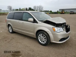 2016 Dodge Grand Caravan SXT with VIN 2C4RDGCGXGR312372, listed as a Copart auction lot 54943615 with 127,576 mi miles and Clean Title. Bid and sale history available at DreamBid. Image 4.