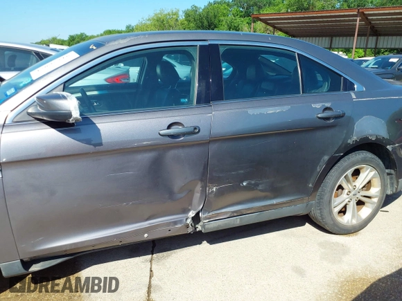 2013 Ford Taurus SEL with VIN 1FAHP2E81DG229444, listed as a IAAI auction lot 42095216 with 211,812 mi miles and . Bid and sale history available at carsss.com. Image 6.