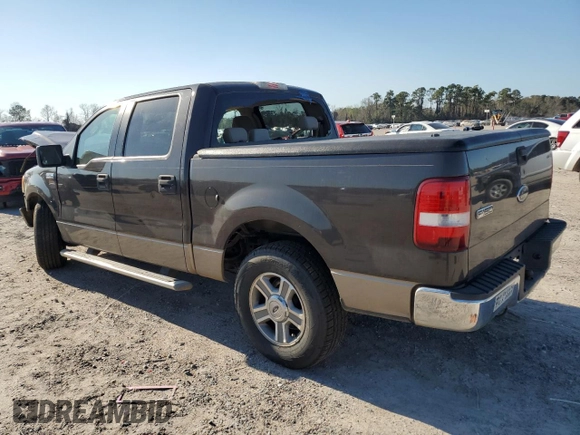 2005 Ford F-150 XLT with VIN 1FTRW12W65KD95732, listed as a Copart auction lot 48598155 with 195,368 mi miles and Salvage Title. Bid and sale history available at DreamBid. Image 2.