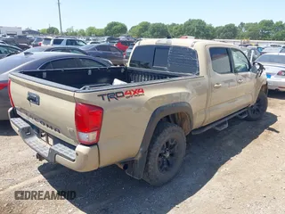 2017 Toyota Tacoma SR5 with VIN 3TMDZ5BN7HM032823, listed as a IAAI auction lot 41996067 with 109,344 mi miles and . Bid and sale history available at DreamBid. Image 4.