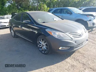 2013 Hyundai Azera with VIN KMHFH4JG9DA198966, listed as a IAAI auction lot 42232410 with 177,041 mi miles and . Bid and sale history available at carsss.com. Image 1.