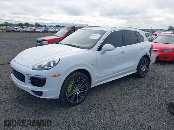 2016 Porsche Cayenne S E-Hybrid z VIN WP1AE2A22GLA17486, wystawiony jako IAAI lot #42229641 z przebiegiem 91 642 mil mil oraz . Historia ofert i sprzedaży dostępna na DreamBid. Obrazek 23.