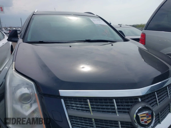 2011 Cadillac SRX Performance Collection with VIN 3GYFNEEY9BS675746, listed as a IAAI auction lot 41735676 with 113,079 mi miles and . Bid and sale history available at carsss.com. Image 13.