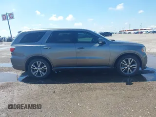 2013 Dodge Durango R/T z VIN 1C4SDHCT7DC564802, wystawiony jako IAAI lot #42348957 z przebiegiem 178 354 mil mil oraz . Historia ofert i sprzedaży dostępna na DreamBid. Obrazek 13.