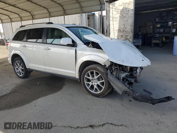 2014 Dodge Journey Limited with VIN 3C4PDCDG8ET170709, listed as a Copart auction lot 84538724 with 147,377 mi miles and Salvage Title. Bid and sale history available at DreamBid. Image 4.